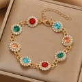 Close-up of colorful rhinestone bracelet with gold alloy base and adjustable lobster clasp - Gold Multicolor Flower Cluster Bracelet (S487)
