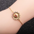 Adjustable golden bracelet with colorful zircon evil eye stones on model wrist - CB0157CX+Box Chain-Gold Fine Chain Colorful Zirconia Sun Evil Eye