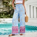 Women's blue floral wide-leg pants with purple border print and elastic high waist - S / Blue