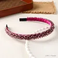 Elegant beaded crystal headband in purple with multi-faceted beads on white plate - Purple