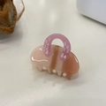 Macro detail of a pink and brown gradient acetate hair claw with white numeric patterns - Pink Gradient Handbag Small