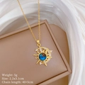 Detailansicht von Sonnen- und Mondanhänger mit blauem Stein und Produktdaten - Gold Sonne Mond Sternenhimmel Stil (E239)