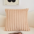 Beige plush lumbar pillow with vertical striped texture on a cozy home sofa - Warm Camel