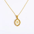 Gold plated oval necklace featuring a white pendant with the letter N detail - Letter N - Gold