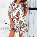 Damesjurk met korte mouwen en een witte basis met rode en groene bloemenprint - S / Abrikoos