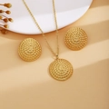 Detailed close-up of golden jewelry set featuring woven texture necklace and earrings - Gold Round Weave Style