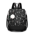 Zaino da donna in tessuto oxford con stampe floreali bianche e ciondolo a pompon - Nero