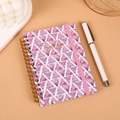 A6 spiral notebook with purple geometric patterns, smile text and elastic strap - Purple Triangle