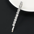 Pasador de pelo plateado con una hilera de brillantes diamantes de imitación en negro - Fila única / Plateado