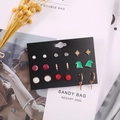 Christmas earring set with festive Santa, deer, and pearl studs on a display card - 9 Pairs/Set Christmas Hat Alloy Simple Studs