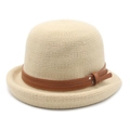 Detailed view of beige knitted fedora featuring a brown leather strap and metal studs - M (56-58cm) / Beige