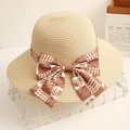 Elegant wide brim straw hat with bow ribbon and Always Happy print for beach sun protection - Off White
