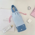 Detail of blue plaid water bottle bag with star patterns and pink drawstring cord - Light Blue Plaid