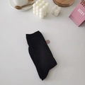 Cute black cotton ribbed socks with floral embroidery in a flat lay display - Wide Striped Black