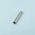Detail of silver cylindrical pendant container with black cap and ring on blue background - Black (Inner) + Steel Color (Outer)