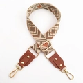Detail of adjustable geometric jacquard bag strap with brown leather and gold hooks - No.8 Green Brown Jacquard + Brown Leather