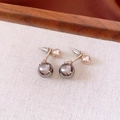 Detail of double pearl earrings with grey and champagne pink beads on gold hardware - Dark Grey Double Pearl Earrings