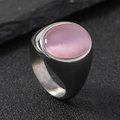 Vintage stainless steel ring featuring an oval pink gemstone with cat-eye effect - 6 / Oval Pink Gemstone / Silver