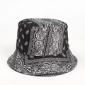 Detail of white paisley pattern on black cotton bucket hat with sharp fabric texture - M (56-58cm) / Black Paisley