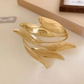 Elegant gold leaf wrap arm cuff featuring a minimalist multi-layer spiral metallic design - Gold Spiral Wrapped Leaf Style