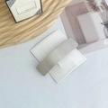 Silver metal rectangular hair clip with vertical brushed texture on a display card - Square Silver