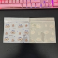 Close-up of cute cartoon puppy ziplock bags with happy dog patterns for snacks and hair clips - Cute Dog