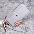 Long light grey faux leather wallet with wrist strap and zipper closure for women - Gray