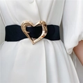 Elastic black waist belt with gold heart metal buckle on a white dress - Black