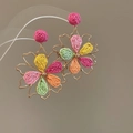 Close-up of vibrant woven floral earrings with colorful petals and golden metal frames - 46# 925 Sterling Silver Earring Post-Colorful-Metal Raffia Flower (HE24970)