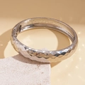 Detailed view of silver geometric textured open cuff bracelet with metallic finish - Pleated Texture / Silver-Wrinkled