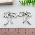Silver hollow bow charms in 2.5cm width for DIY jewelry making and necklace crafts - Small Bowknot - Silver (21383)