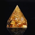 Orgone energy pyramid with yellow crystal, copper spiral and gold leaf in resin - Amber Resin