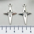 Pair of silver alloy star charms with measuring ruler showing 2.5cm size details - Large Hollow Cross Star 15x25mm