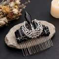 Detailed view of silver moon hair comb with raw black crystal points and gothic style - Black Crystal + Hollow Moon