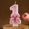 Pink glitter number 1 birthday candle with a cute 3D bow on a wooden base - Number 1