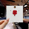 Cute red four-leaf clover enamel brooch pin with gold metal finish on display card - 31*Red Four Leaf Clover Pin