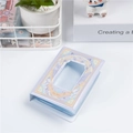 Detail of lavender 3-inch mini photo album with star cut-out cover and PVC texture - Wings Door