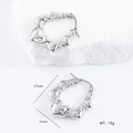 Detailed view of silver heart-shaped hoop earrings with size 27mm and weight 13g specs - Continuous Heart Style (款式5)