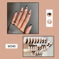 Detailed view of nude press-on nails with black and white heart motifs and French tips - W040 Black White Heart