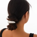 Minimalist metallic elastic hair ring in polished silver finish for low bun hairstyles - Silver Curved (0575)