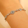 Close-up of elegant silver crystal snowflake bracelet on wrist with sparkling zircons - Silver Snowflake Shape Style (DZ-105)