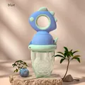 Morandi blue dinosaur baby fruit feeder pacifier with silicone mesh bag on a stone - Monyin Blue Dinosaur / Blue