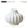 Short white striped ceramic vase with wavy texture and rounded modern nordic design - White Short Style