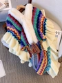 Boho knit poncho with multi-color wave patterns, white faux fur collar, and fringe tassels - Blue