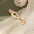 Elegant 7.2cm golden crossover pearl hair clip with white faux pearls for women - Duckbill Clip Bow Style