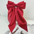 Elegant large red satin bow hair clip with matte ribbon and silver metal spring fastener - Burgundy