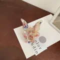 Colorful marbled acetate butterfly hair claw clip with elegant shell finish - Rainbow