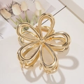 Elegante pinza para el cabello de flor hueca dorada con un acabado metálico brillante - Flor Hueca / Dorado