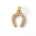 Detailed view of a gold-plated horseshoe pendant with sparkling zircon stone inlays - 06-Golden Horseshoe