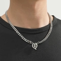 Gothic letter D pendant on silver Cuban link chain necklace worn by a model - Silver Letter Q